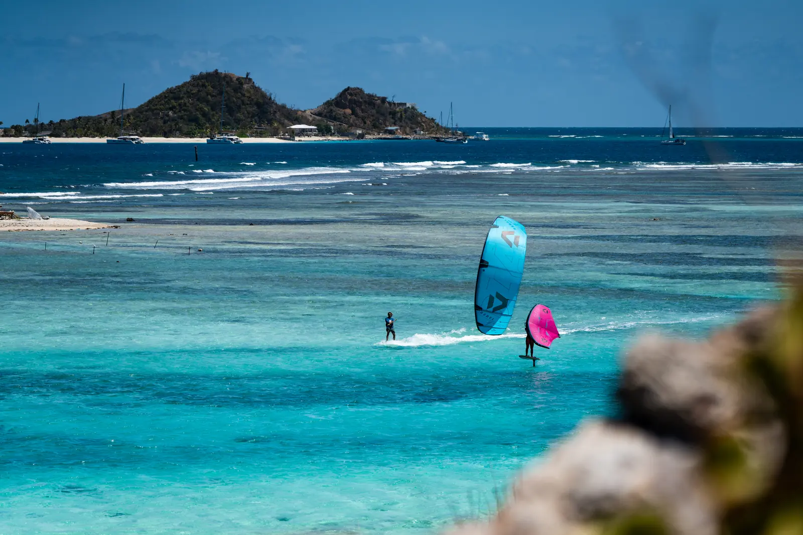 Kite and wing riders on the Union Island reef
