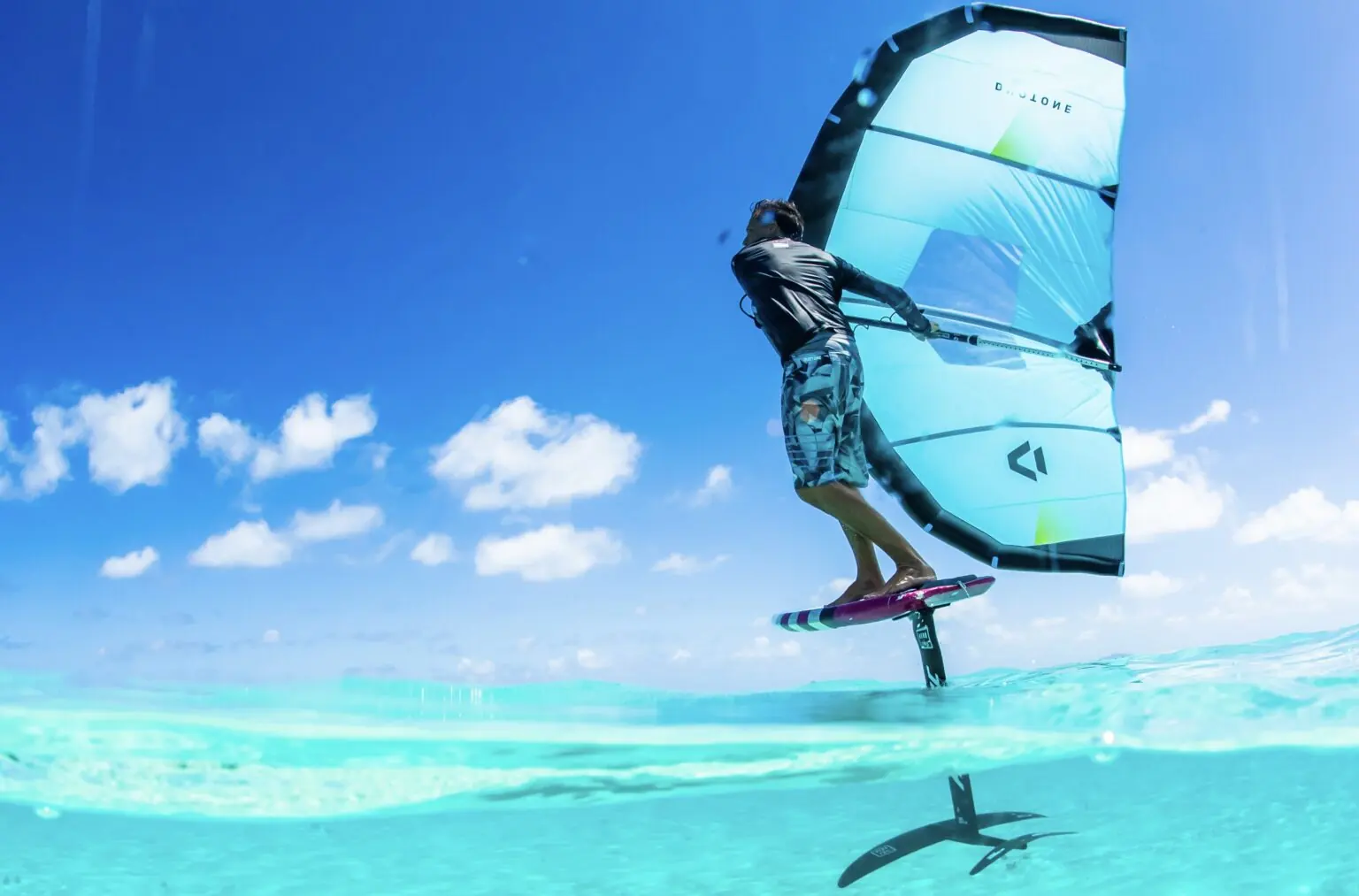 Wing foiler riding in Caribbean trade wind conditions